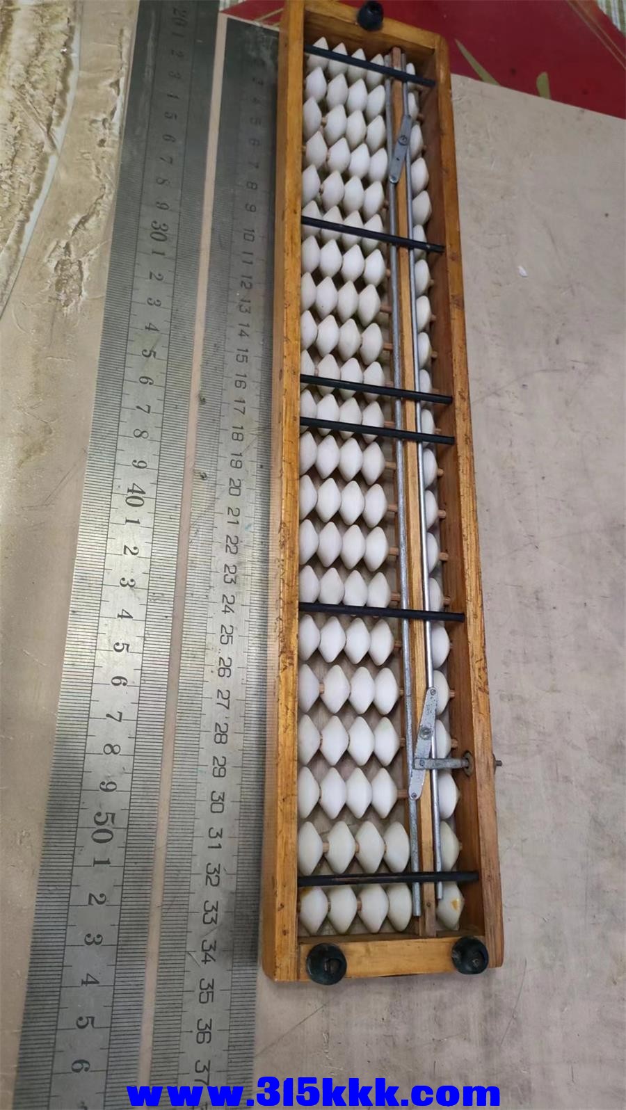 82号算盘大的20元小的15元小的差一个回弹弹簧其它完好 (7).jpg