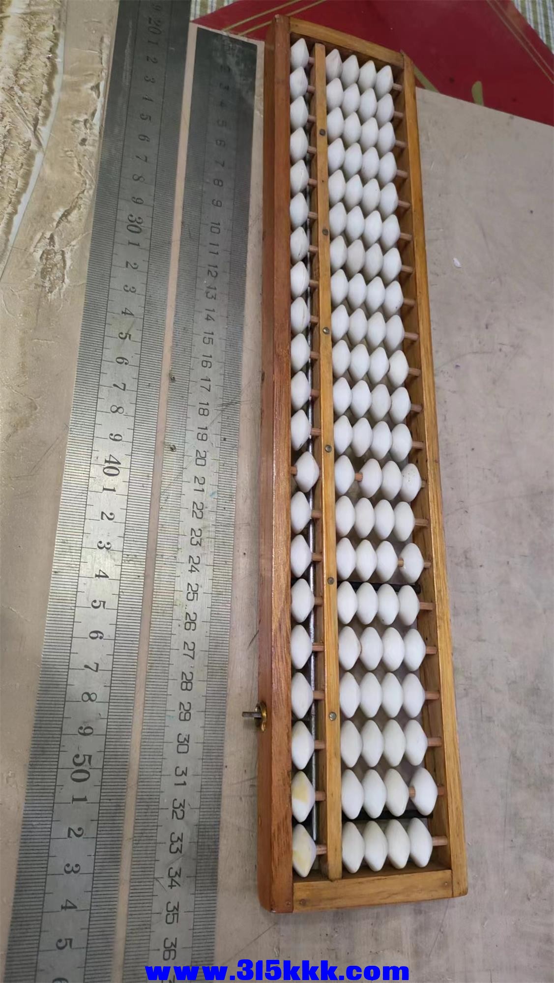 82号算盘大的20元小的15元小的差一个回弹弹簧其它完好 (9).jpg